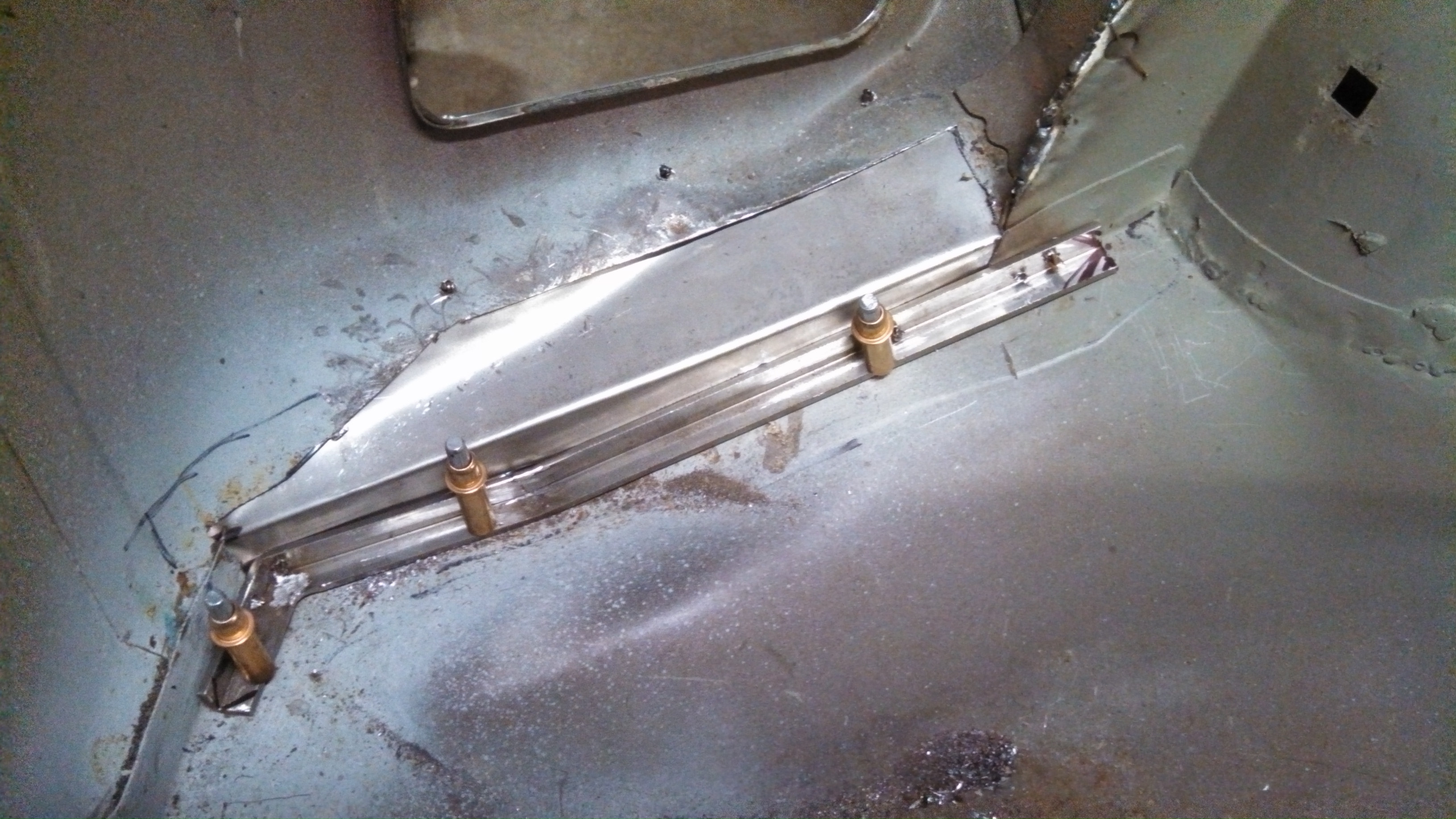 rear dr rust repair patch inside.jpg