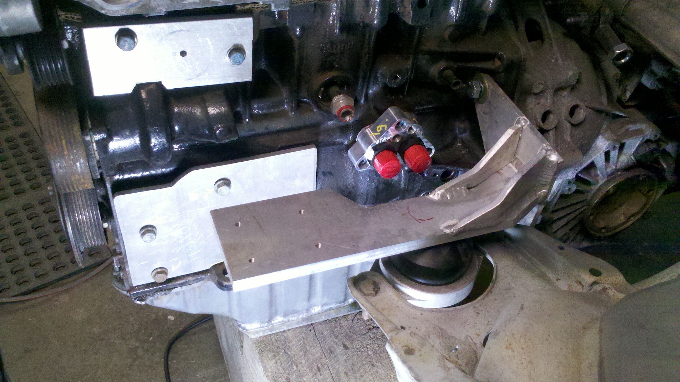 drivers side eng arm gettign there.jpg