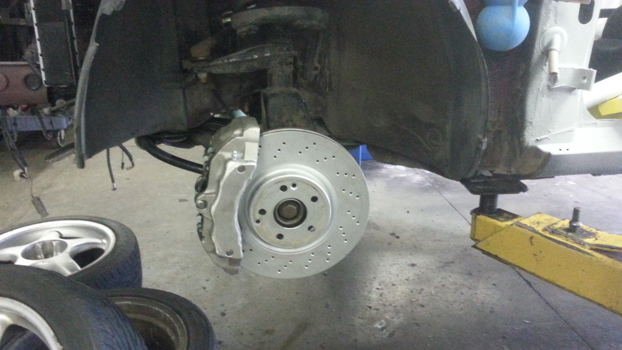 brake setup, no adapters because they weren't allowed, just some grinder work