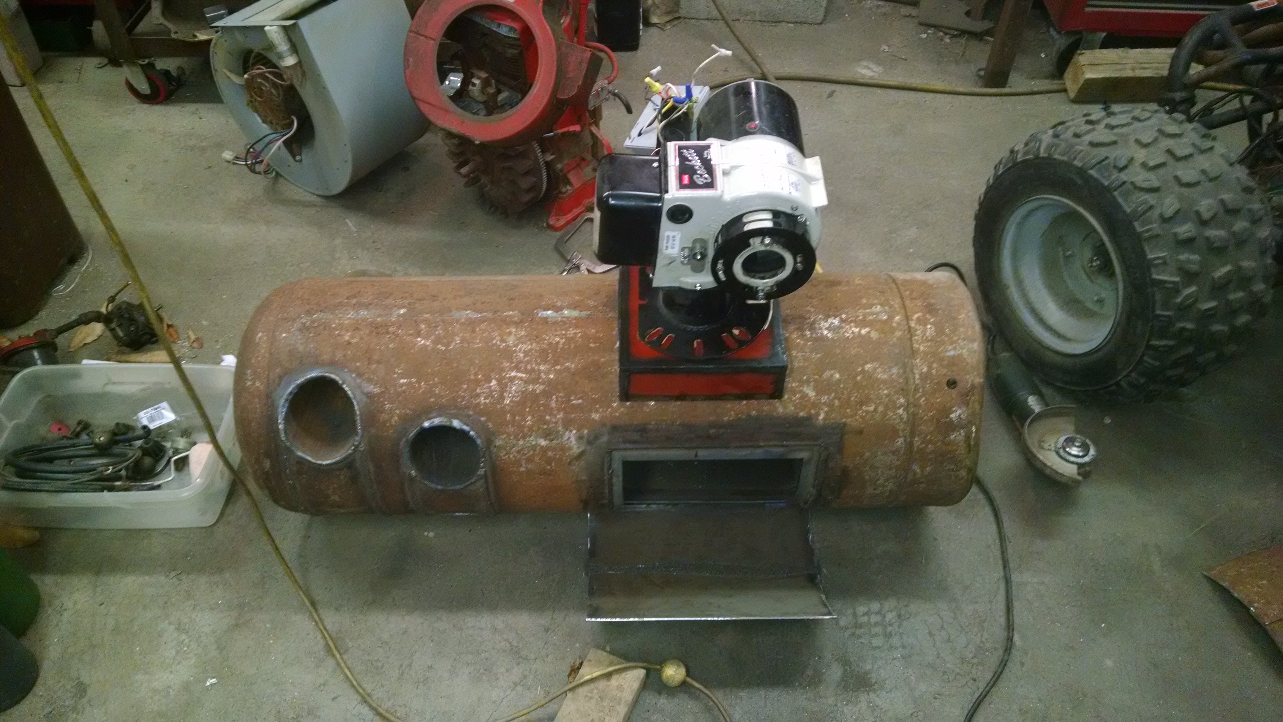 I'm using a oil burner that was going to get scrapped since it was attacked to a cracked furnace(freebie!). It's only being used as a blower since this is a drip style burner.