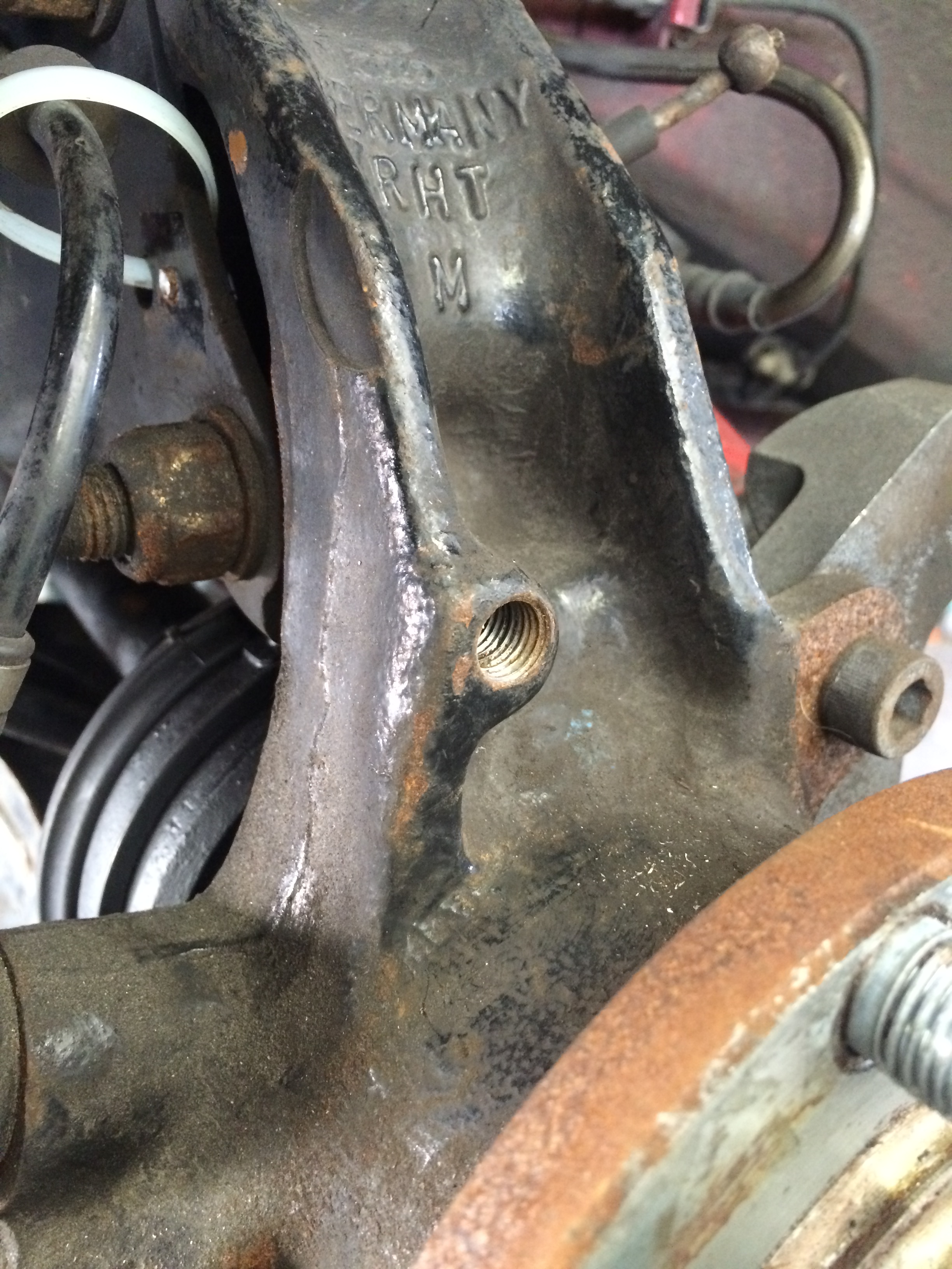 Mounting hole drilled &amp; tapped