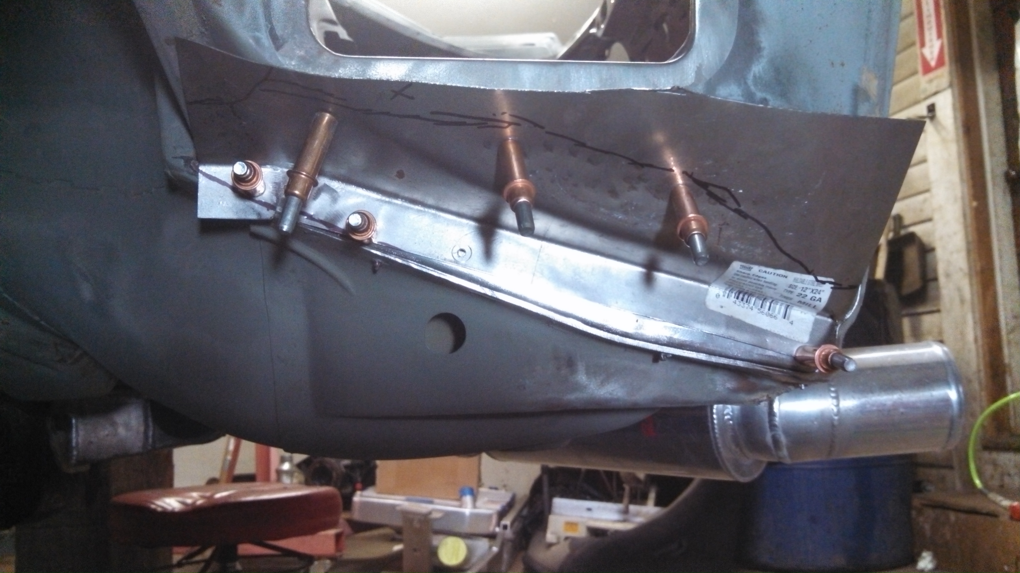 rear dr rust patch being made to fit.jpg
