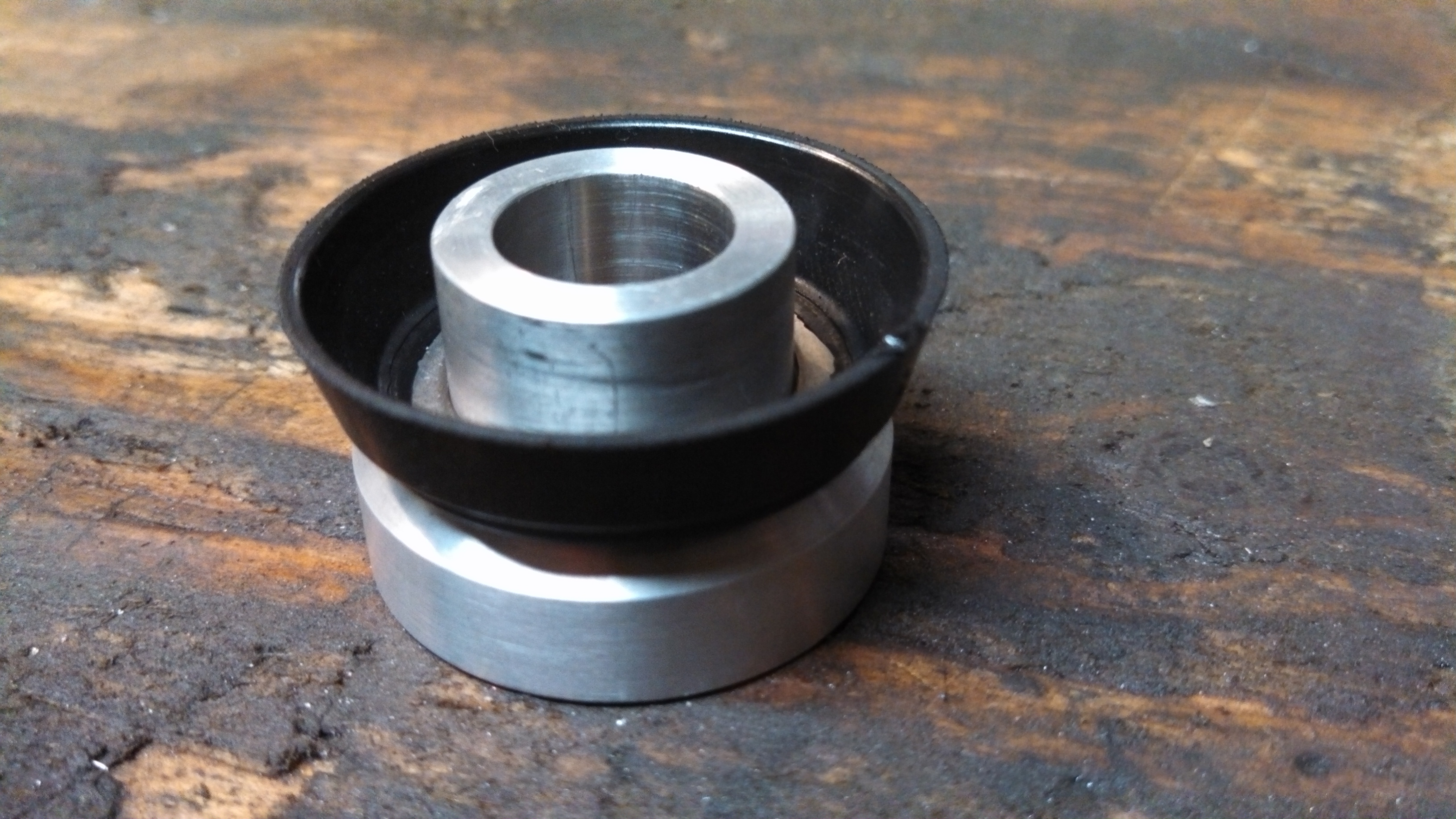 c-arm rod end spacer with seal.jpg